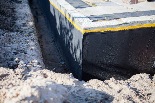 Professional Waterproofing technician working in Marriottsville, MD